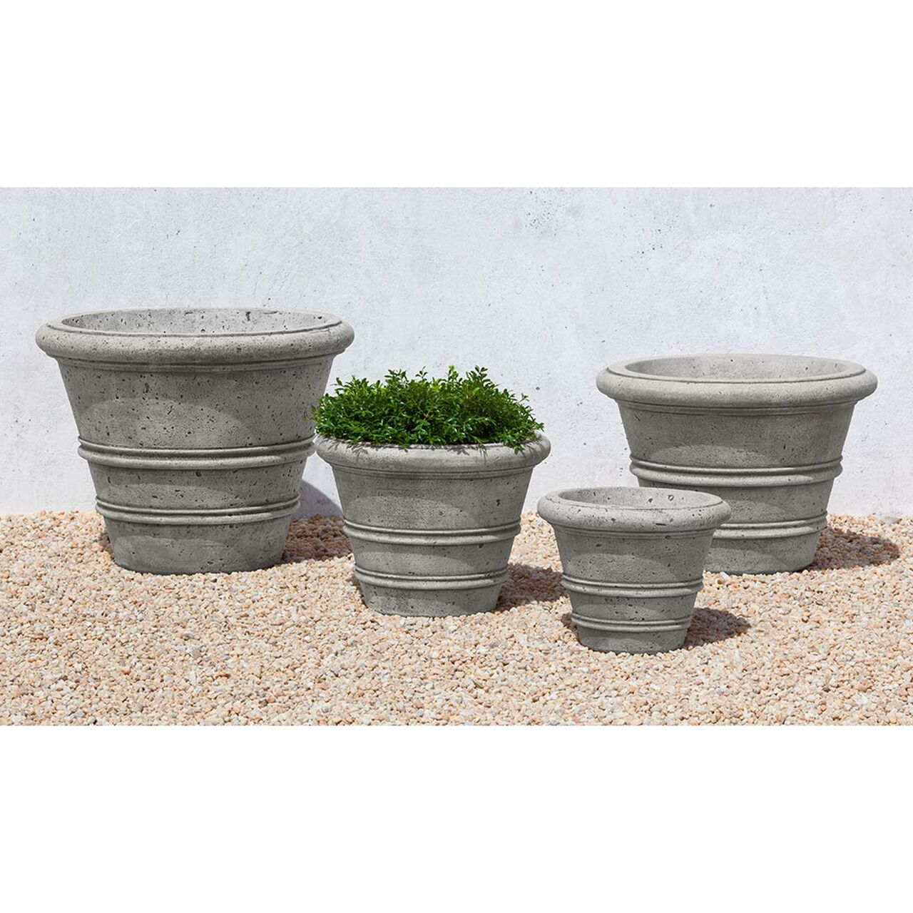 https://www.kinseyfamilyfarm.com/s/wp-content/uploads/planters-stone/rustic-rolled-rim-planters.jpg